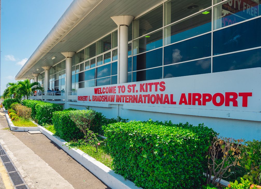 The Welcome to St Kitts sign on the terminal at Robert L. Bradshaw International Airport